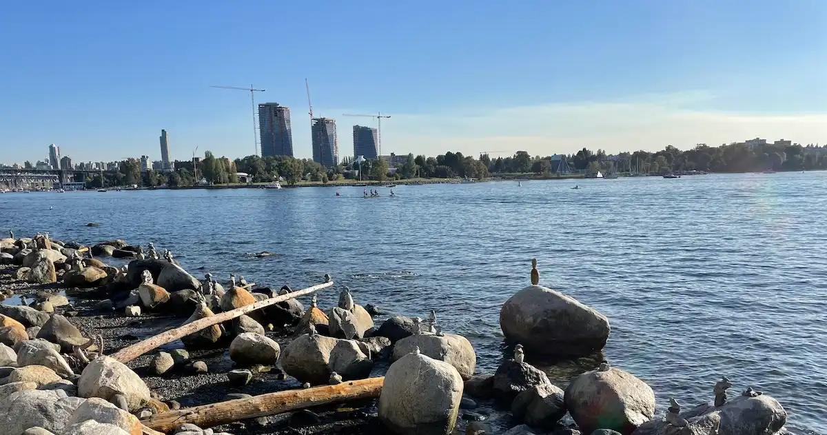 Stones piles on the shore at English Bay, Vancouver, Canada